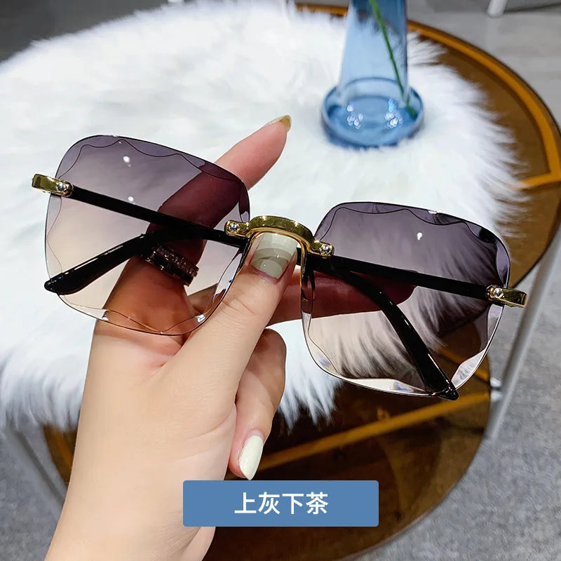 2024 New Rimless Women Sunglasses Fashion Gradient Lenses Sun Glasses Lady Vintage Alloy Legs Classic Designer Shades UV400