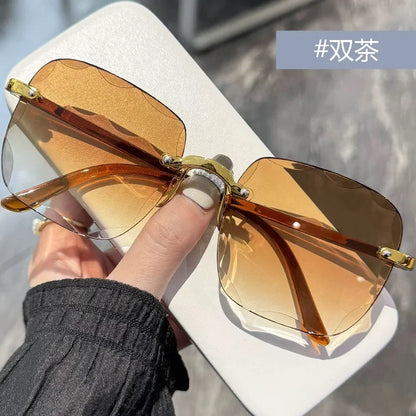 2024 New Rimless Women's Sunglasses Fashion Gradient Lenses Sun glasses Lady Vintage Alloy Legs Classic Designer Shades UV400